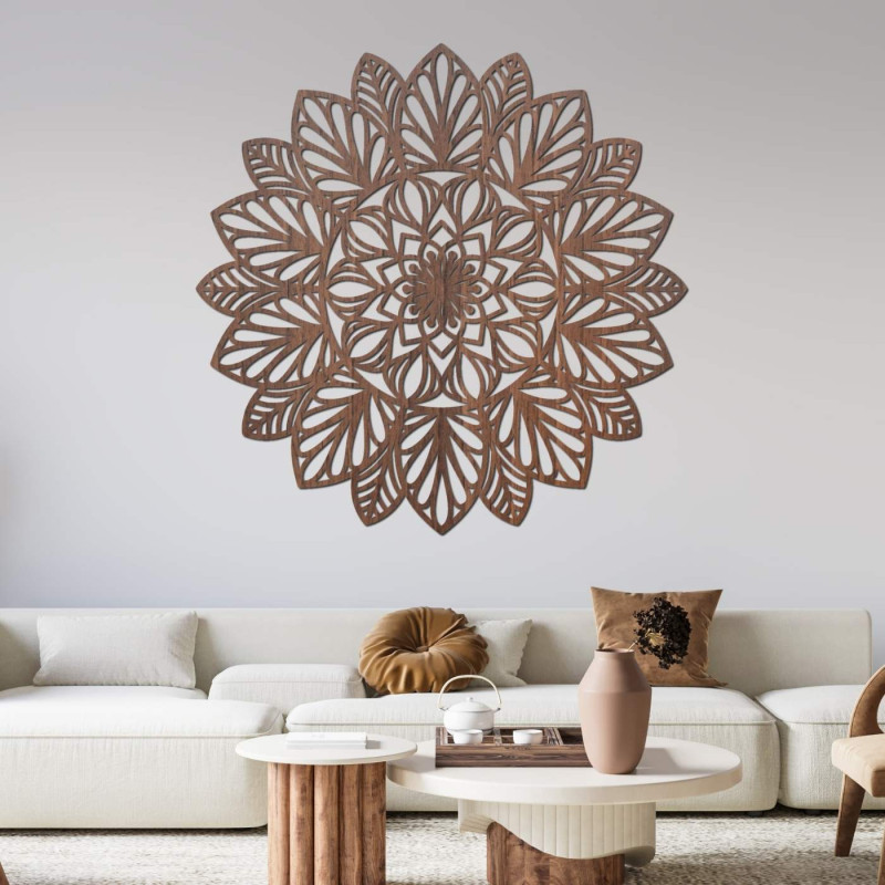 A finely carved mandala on the wall as a dominant element of a modern interior.