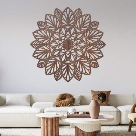 A finely carved mandala on the wall as a dominant element of a modern interior.