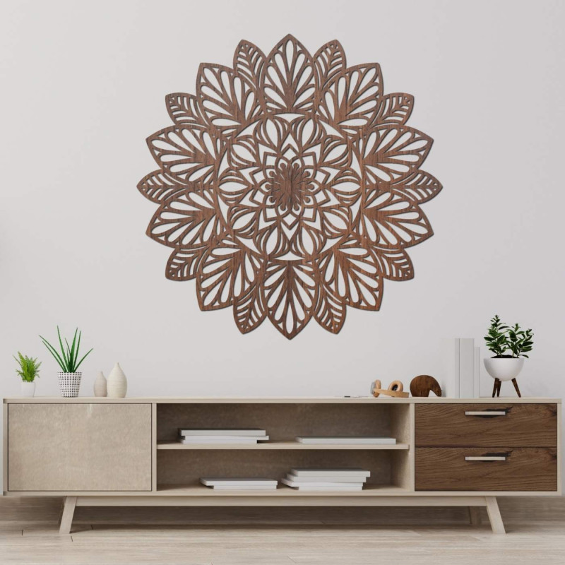 A finely carved mandala on the wall as a dominant element of a modern interior.