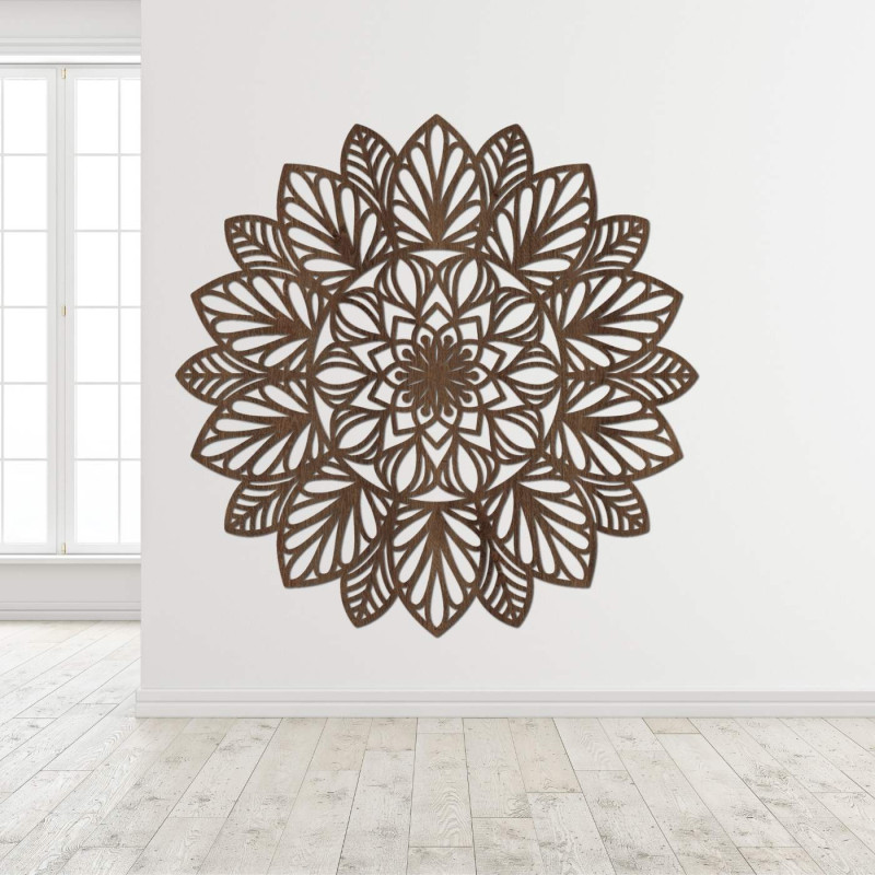 A finely carved mandala on the wall as a dominant element of a modern interior.