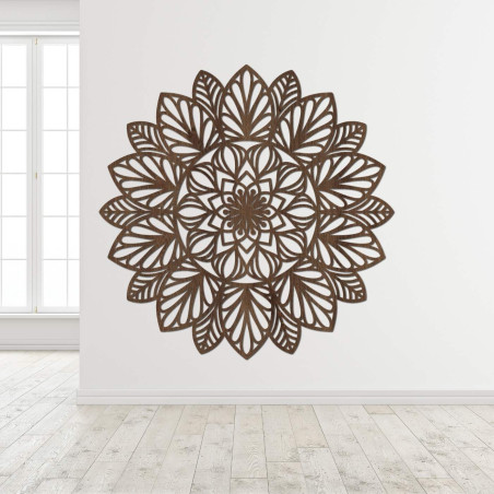 A finely carved mandala on the wall as a dominant element of a modern interior.