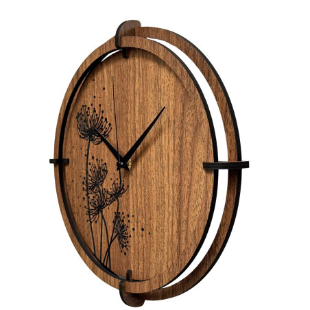 Modern wall clock made of dark wood for the interior.