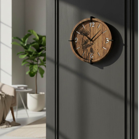 Detail of engraved dandelions on a wooden clock in walnut decor.