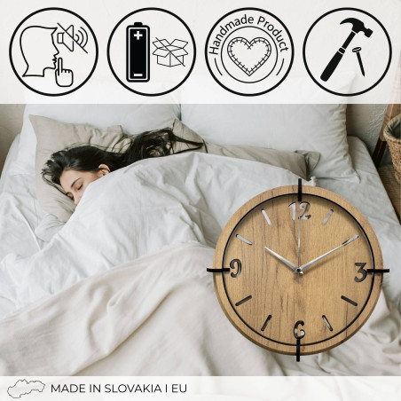 Elegant wall clock in natural oak style with black hands.