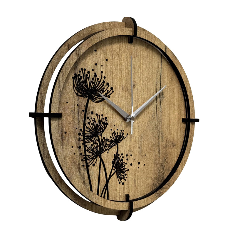 Modern wooden clock with golden oak and black meadow motif.
