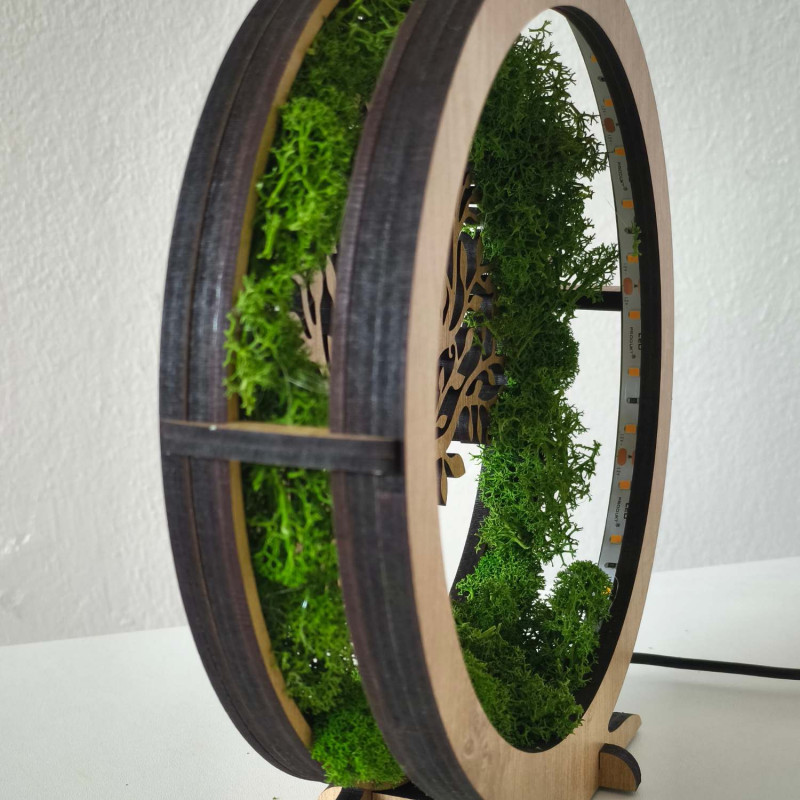 Stylish table lamp with the symbol of the Tree of Life and green moss.