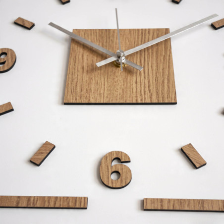 Designer wall clock made of HDF, oak pattern and white plexiglass