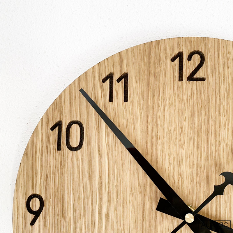 Modern wall clocks made of high-quality oak plywood are an elegant and timeless addition to any interior.