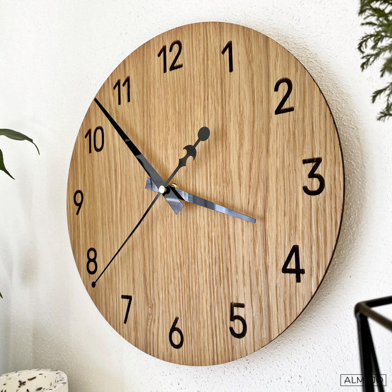 Modern wall clocks made of real oak wood bring a combination of craftsmanship, silence, and timeless aesthetics.