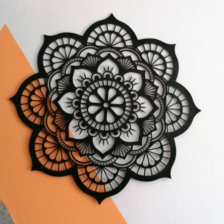 Natural wooden wall decoration in the shape of a blooming flower