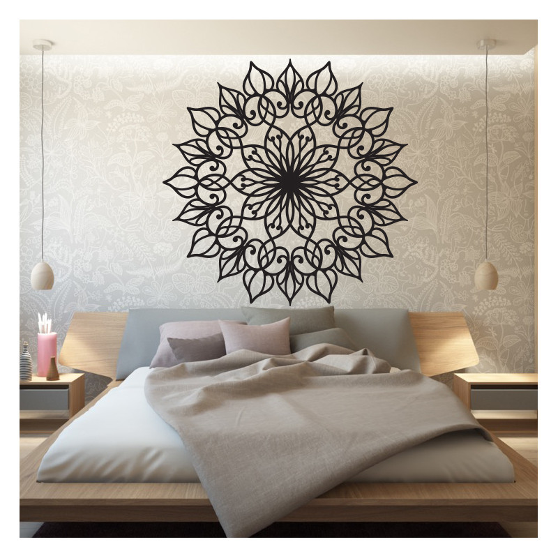 A wooden mandala is a fascinating wall painting that symbolizes harmony and balance.