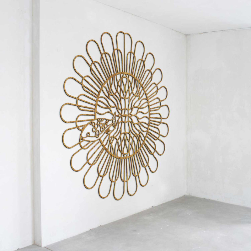 Carved 3D image of a four-toothed fish mandala made of black HDF board