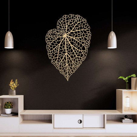 A designer wooden picture with a leaf detail for tasteful and cozy living