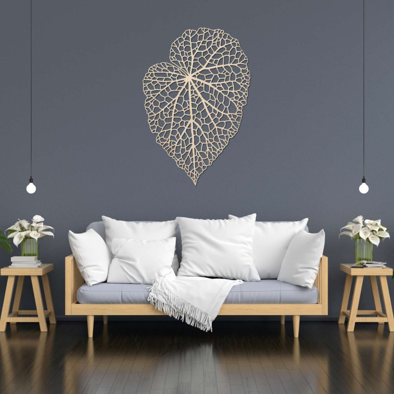 A designer wooden picture with a leaf detail for tasteful and cozy living