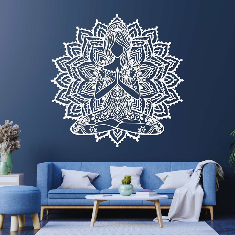 Wooden mandala yoga woman on the wall - modern decoration for a peaceful interior.