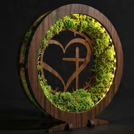 Stylish decoration with a spiritual motif. LED lamp with moss in an elegant walnut decor.