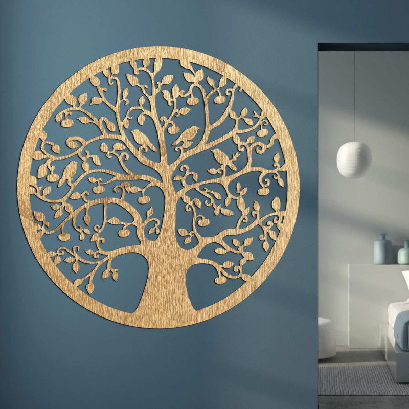 Circular wooden decoration Tree of Life in black design above the chest of drawers.