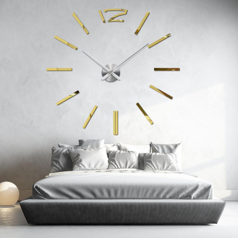 Modern wall clock in gold for an elegant bedroom