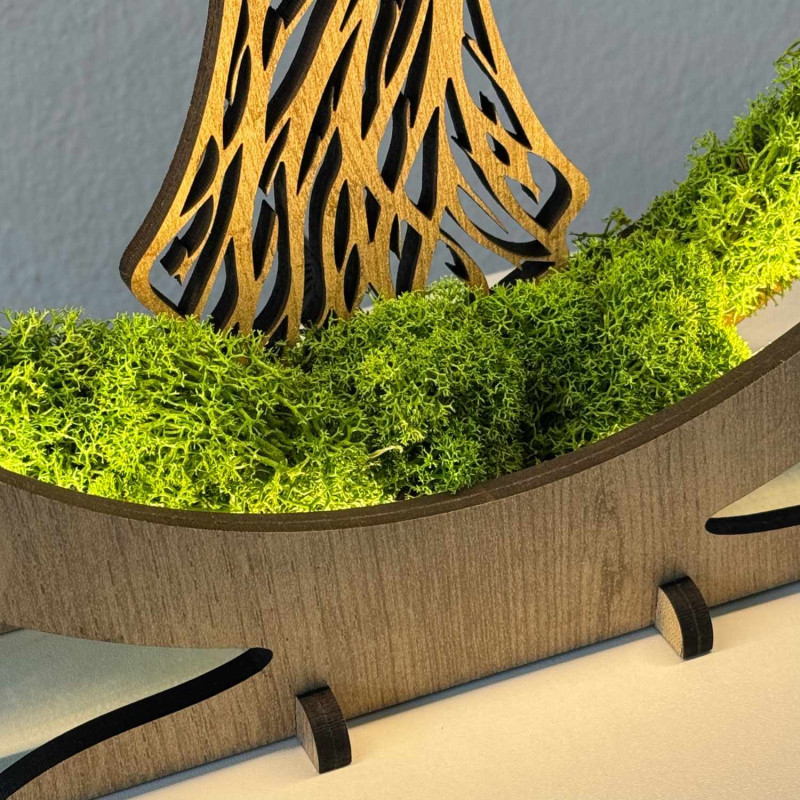 Luminous angel made of wood with stabilized moss and LED lighting