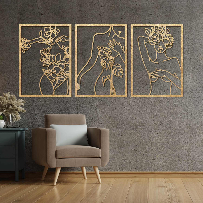 Elegant three-part painting of a woman with floral elements on the wall