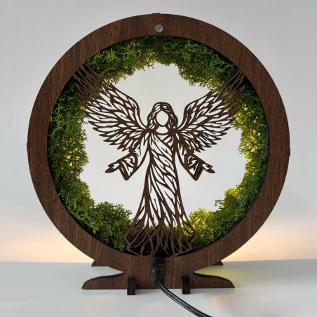 Original table decoration with angel, moss and LED lighting