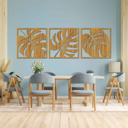 Wooden wall decoration with a tropical leaf motif in black