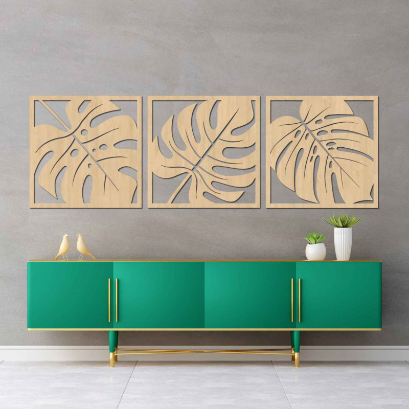 Wooden wall decoration with a tropical leaf motif in black