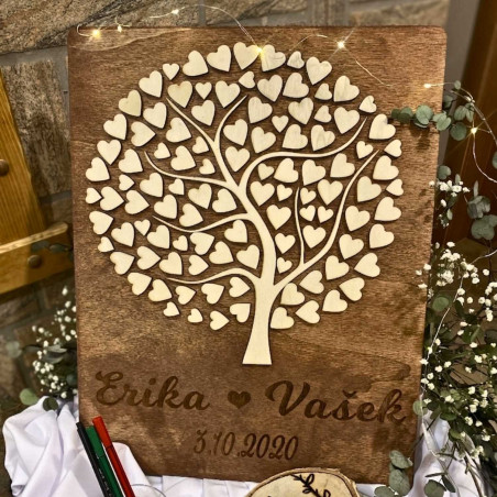Wooden wedding guest book with engraving of names and wedding date