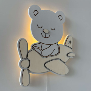 Children's LED lamp Teddy Bear in a plane combines safe lighting, quality workmanship and stylish design