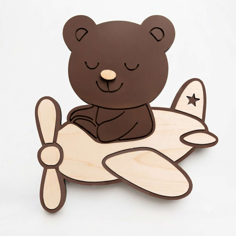 Original wooden LED lamp with an airplane and a teddy bear for a modern children's room