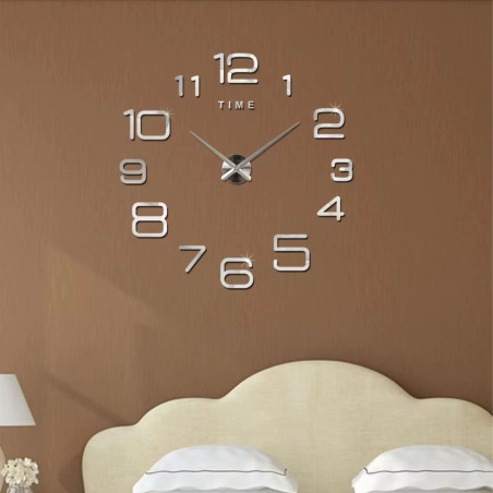 Stylish adhesive clock made of acrylic plexiglass with a silver mirror surface