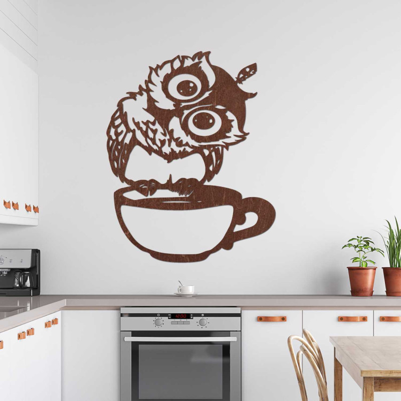 A cheerful wooden owl with coffee as a unique interior accessory