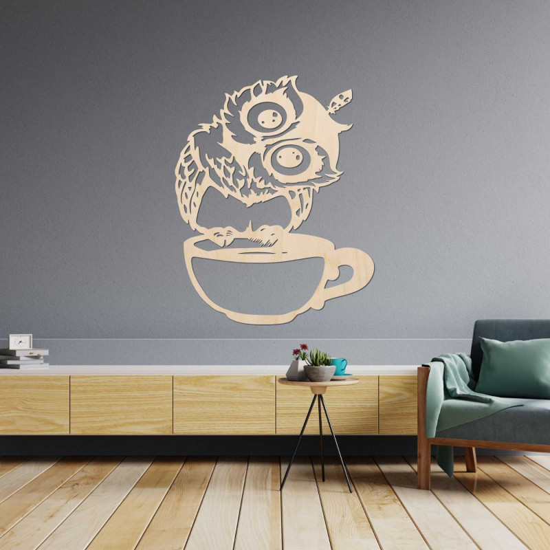 A cheerful wooden owl with coffee as a unique interior accessory