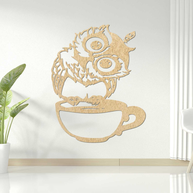 A cheerful wooden owl with coffee as a unique interior accessory