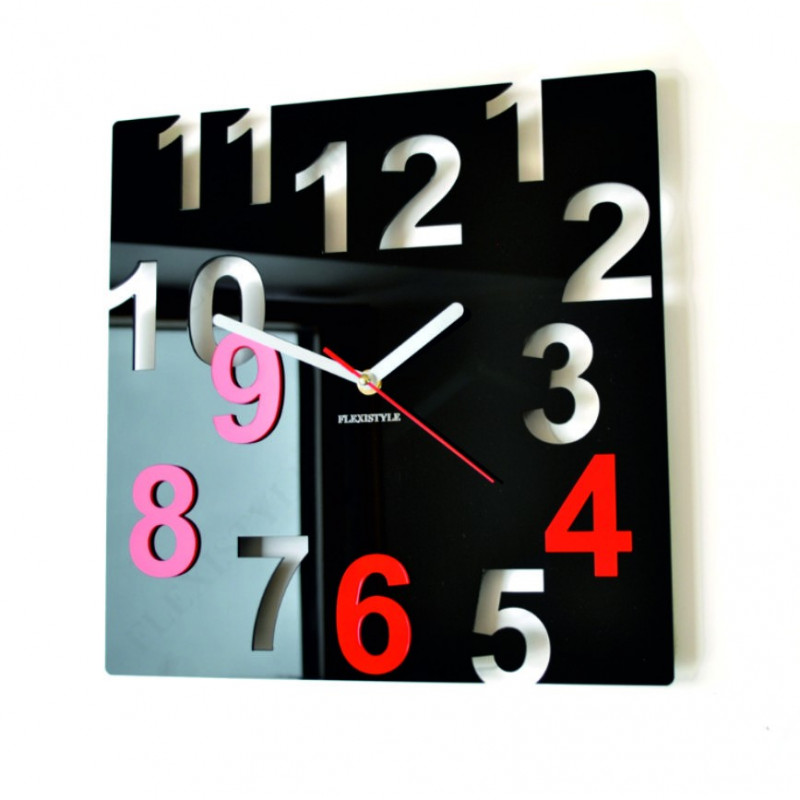 Modern wall clock made of plexiglass. Trendy clock on the wall as a gift. X-momo clocks. PMMA