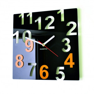 Modern wall clock made of plexiglass. Trendy clock on the wall as a gift. X-momo clocks. PMMA