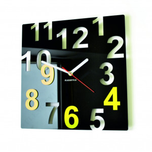 Modern wall clock made of plexiglass. Trendy clock on the wall as a gift. X-momo clocks. PMMA