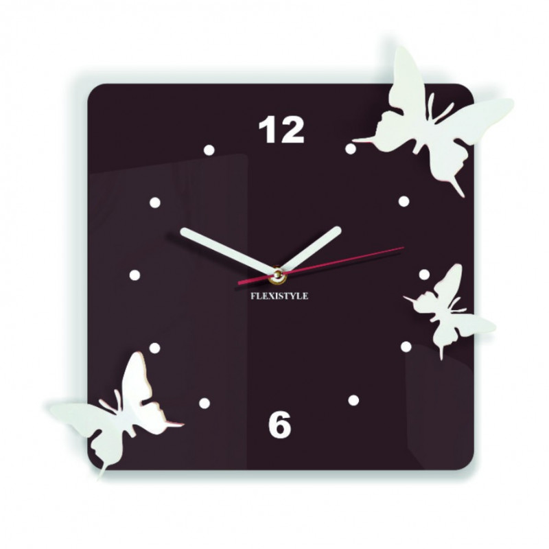 Modern wall clock made of plexiglass. Trendy clock on the wall as a gift. X-momo clocks. PMMA