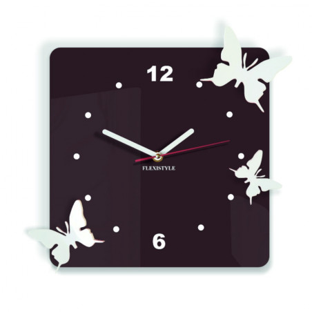 Modern wall clock made of plexiglass. Trendy clock on the wall as a gift. X-momo clocks. PMMA Modern wall clock made of plexiglass. Trendy clock on the wall as a gift. X-momo clocks. PMMA