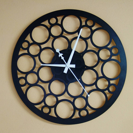 Wall clock made of wood plywood in the footsteps of time Wall clock made of wood plywood in the footsteps of time