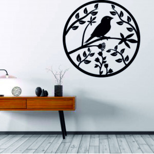 A wooden painting on a wall of plywood is already spring bird bird.